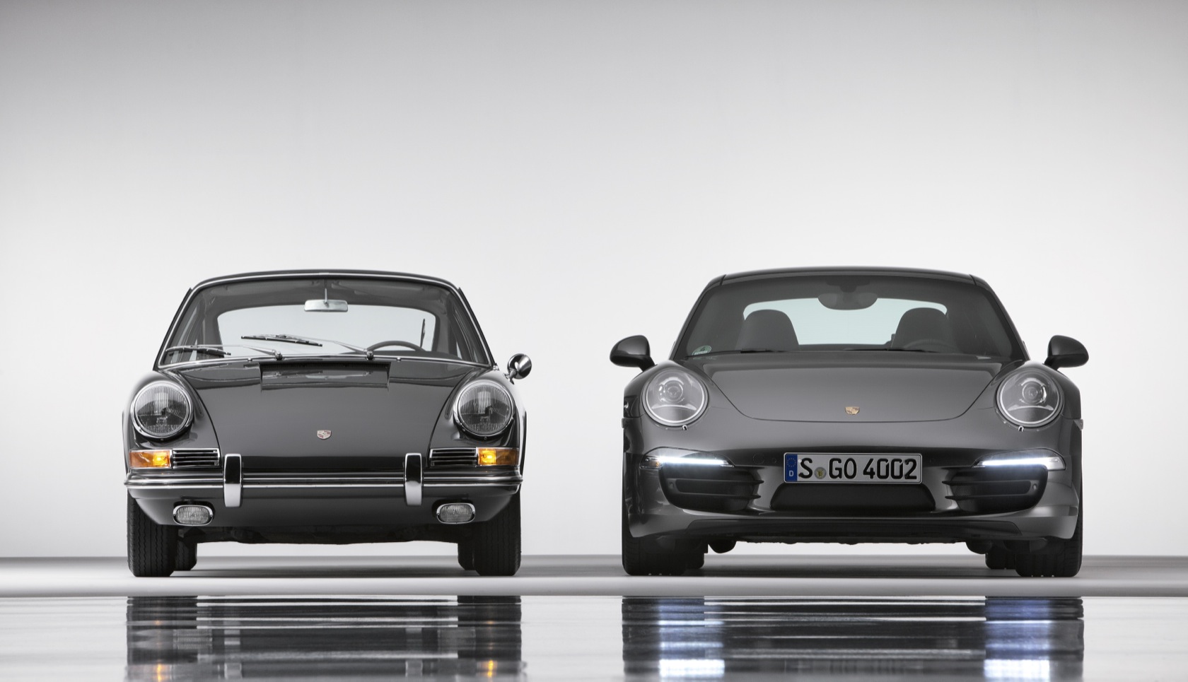 Porsche 911 Carrera 4S Coupé© und Porsche 911 2.0 Coupé© (Baujahr 1964)
